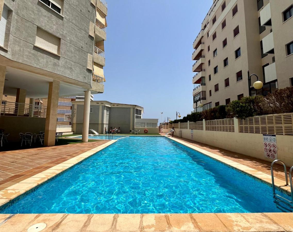 Primera Linea Con Piscina En Calpe Bagian luar foto